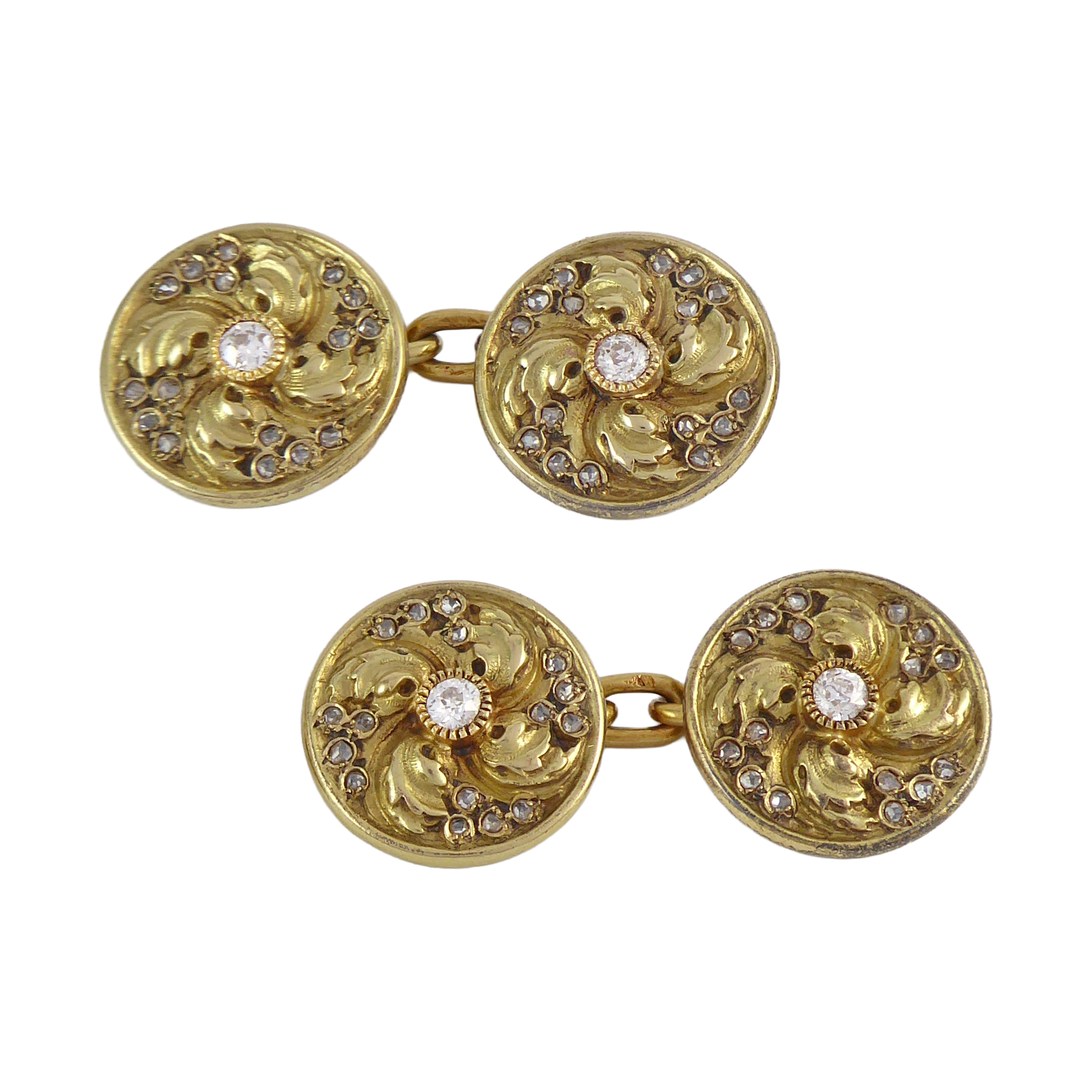 Pair of 19th century gold and diamond foliate swirl cufflinks, French c.1880,